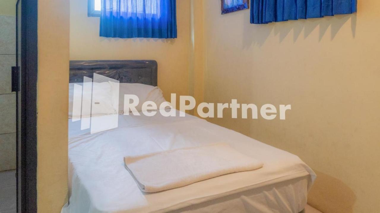 Vandhela Homestay Syariah Mitra Reddoorz Sorabaya Extérieur photo